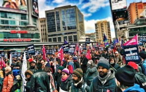Striking academic workers rally in downtown Toronto 