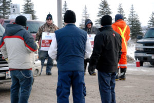 Unifor Local 3264 workers picketing outside both Carmeuse Lime gates on County Road 6 on Sunday, Jan 18, 2015, near Beachville, Ont. (Photo:Megan Stacey/ Sentinel-Review)