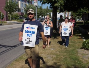 COPE 378 members have set up a picket line outside the BC Automobile Association Road Assist Contact Centre on Goring Street in Burnaby.