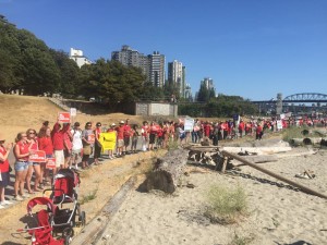 Protestors form human chain along Vancouver's seawall at Sunset Beach. 