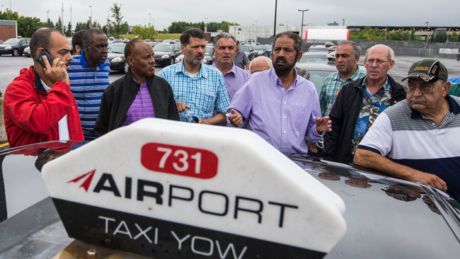 Ottawa's airport taxi drivers protesting and blockading Airport Parkway, September 2015.